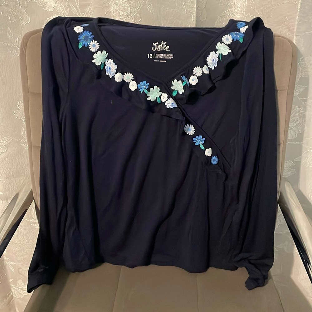 Navy blue long-sleeve top with a flower “collar”